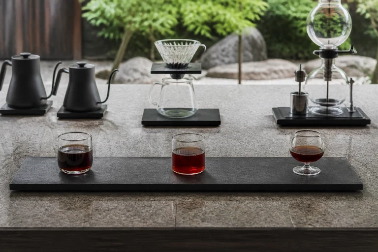 AI-generated editorial image representing the coffee experience at KOFFEE MAMEYA Kakeru